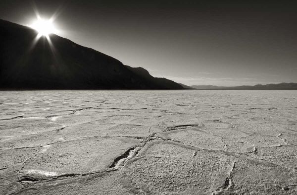 CA, Death Valley Sunburst over salt pan